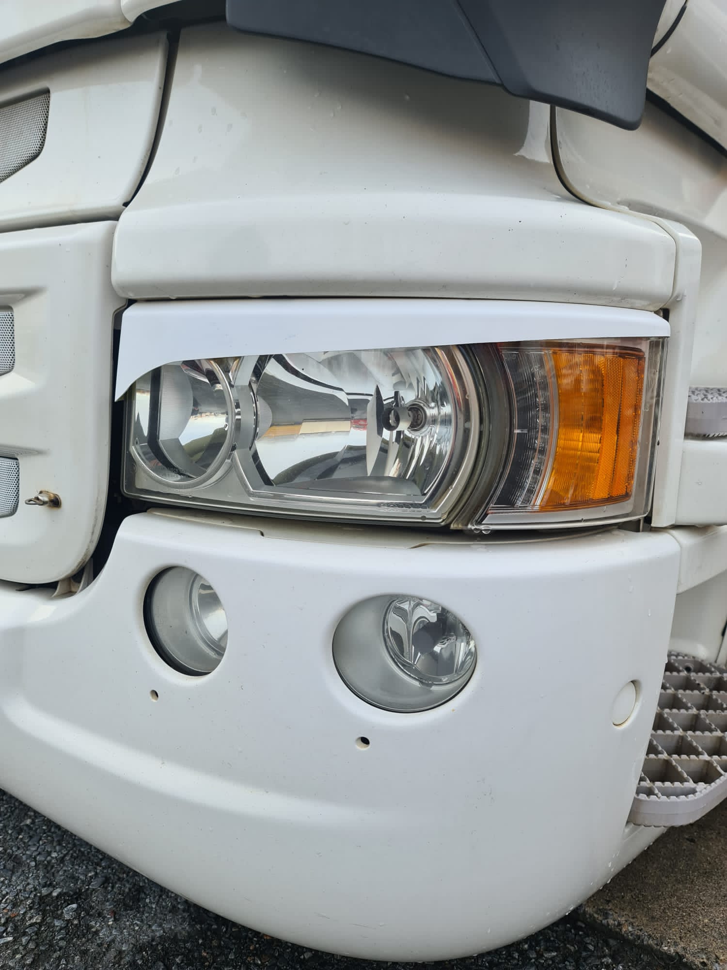 Scania R headlight cover "evil eye"